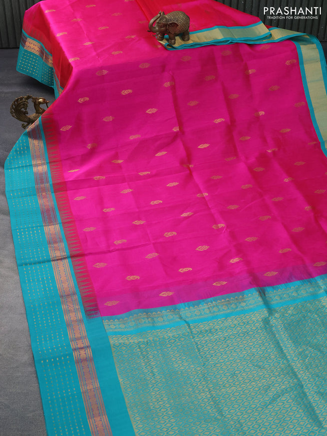 Silk cotton saree pink and teal blue with zari woven buttas and temple design zari woven border