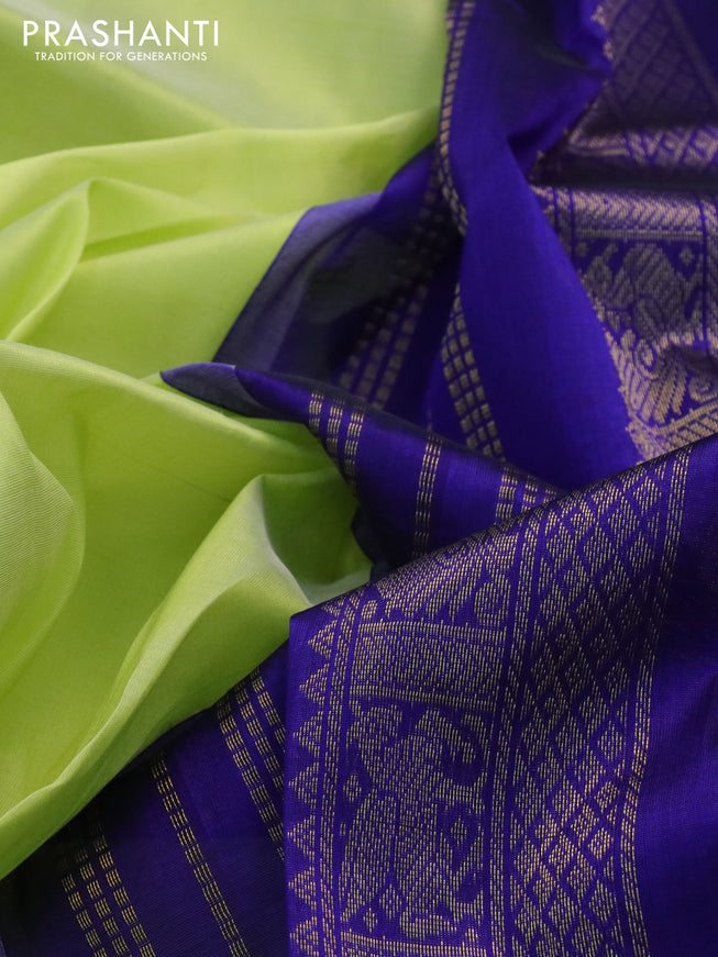 Silk cotton saree pista green and blue with plain body and zari woven korvai border