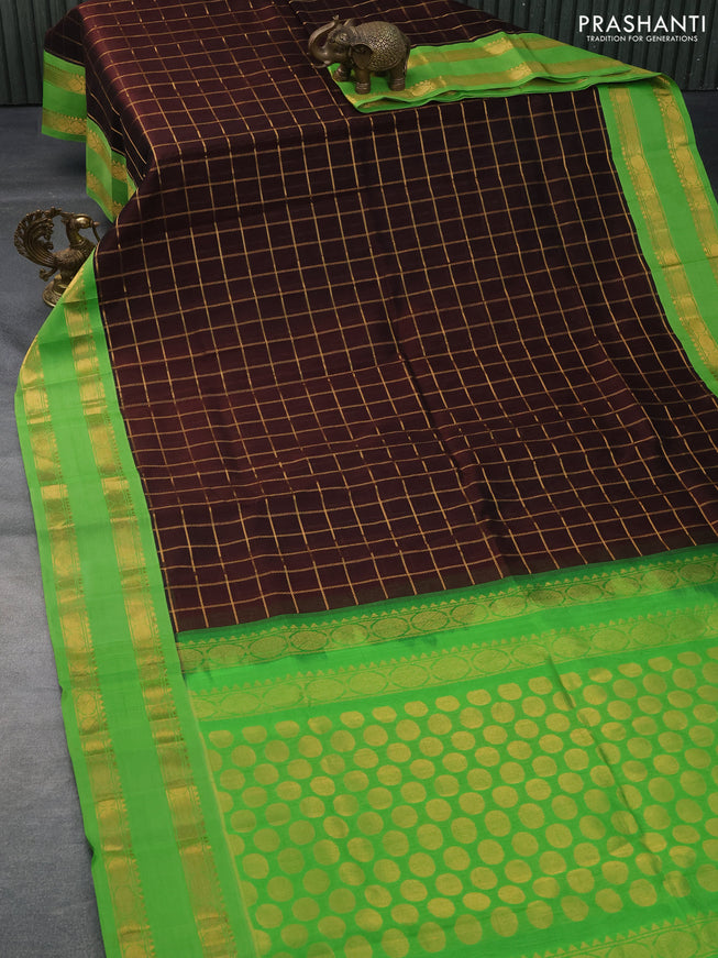 Silk cotton saree brown and light green with allover zari checked pattern and rettapet zari woven korvai border