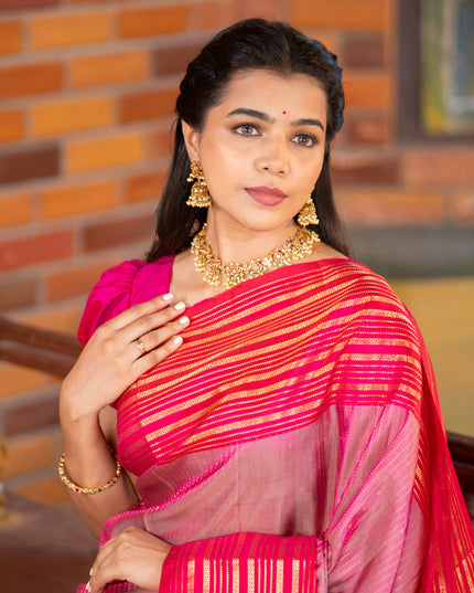 Pure soft silk saree dual shade of pink and pink with allover zari weaves and long zari woven border