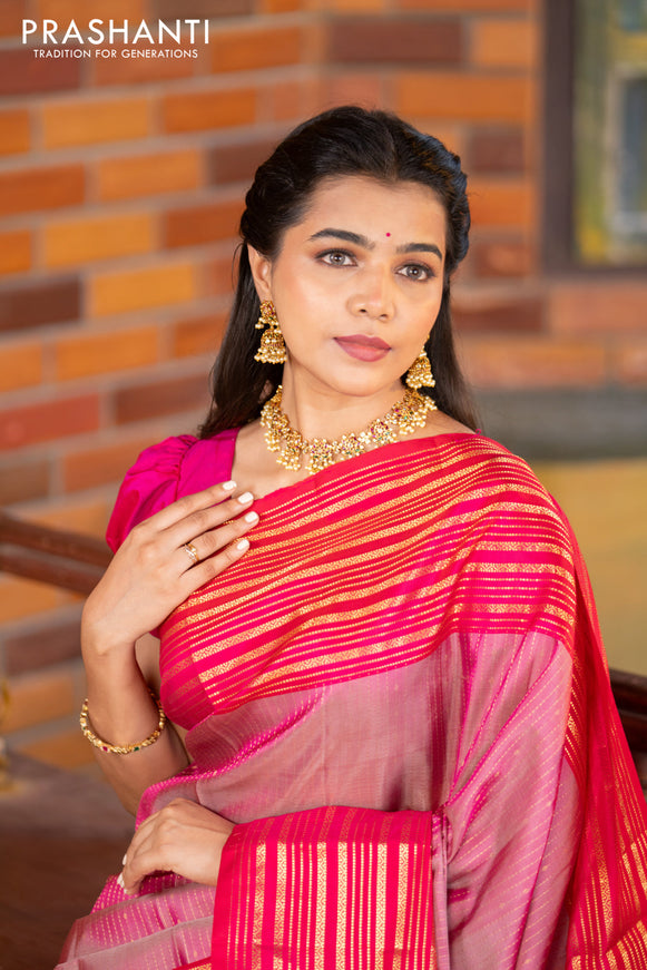 Pure soft silk saree dual shade of pink and pink with allover zari weaves and long zari woven border