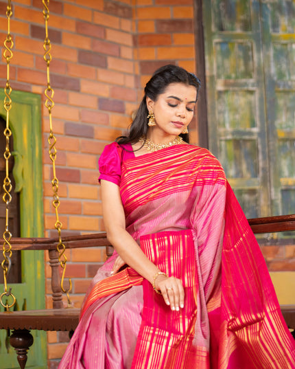 Pure soft silk saree dual shade of pink and pink with allover zari weaves and long zari woven border