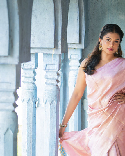 Pure kanchipuram silk saree pastel pink with allover silver zari woven brocade weaves in borderless style