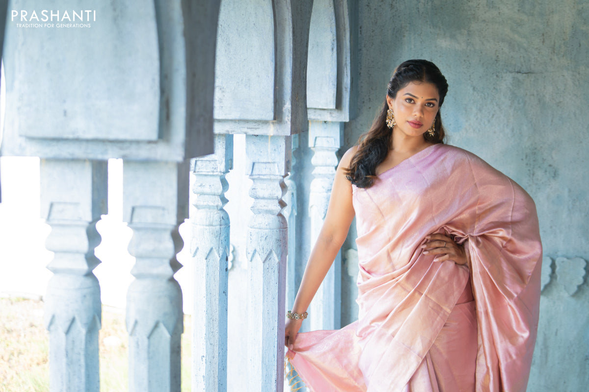 Pure kanchipuram silk saree pastel pink with allover silver zari woven brocade weaves in borderless style