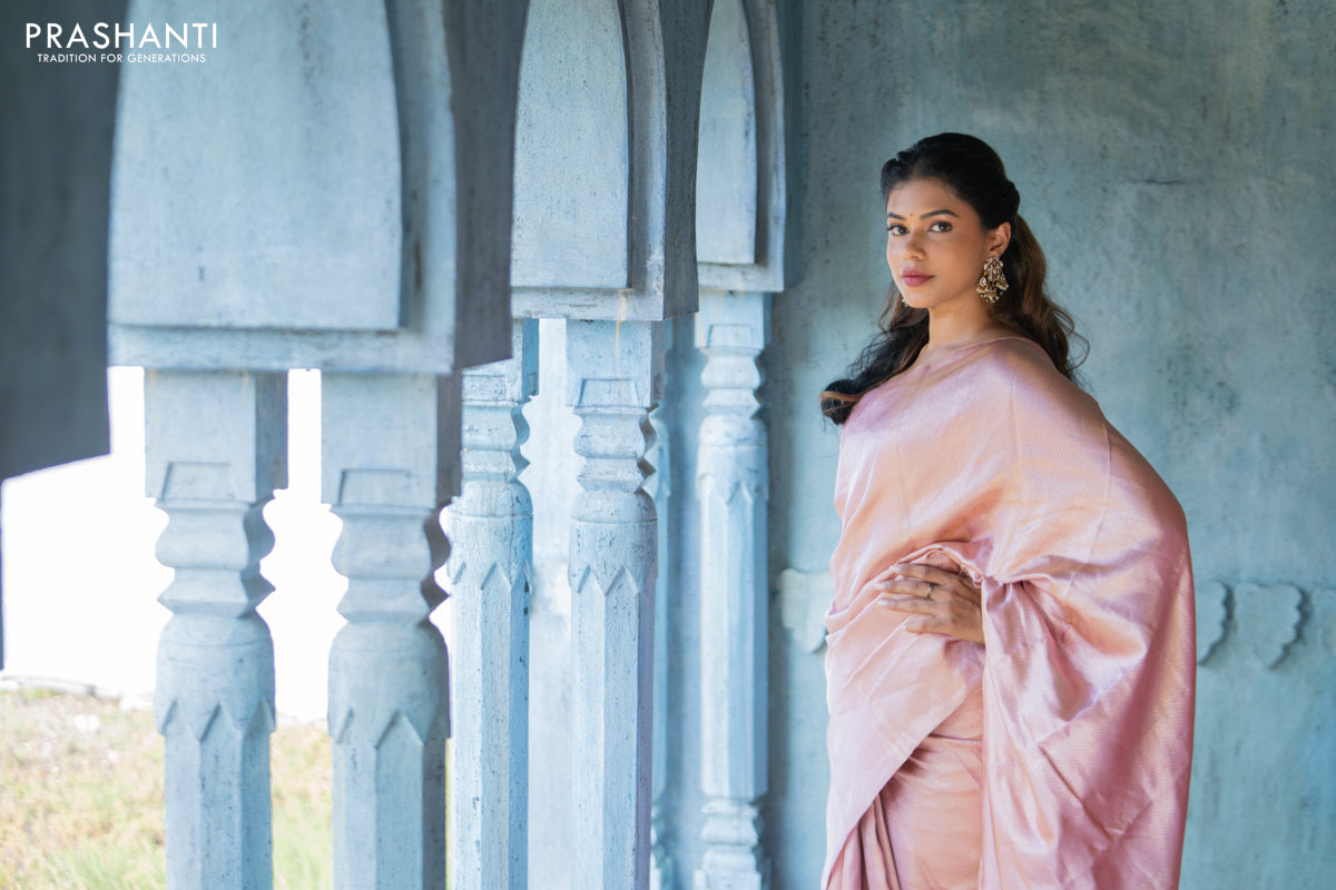 Pure kanchipuram silk saree pastel pink with allover silver zari woven brocade weaves in borderless style