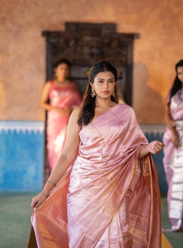 Pure kanchipuram silk saree pastel pink with allover silver zari woven brocade weaves in borderless style