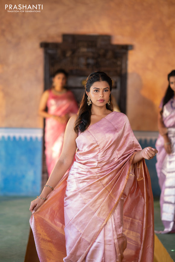 Pure kanchipuram silk saree pastel pink with allover silver zari woven brocade weaves in borderless style