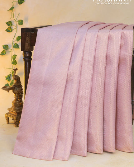 Pure kanchipuram silk saree pastel pink with allover silver zari woven brocade weaves in borderless style