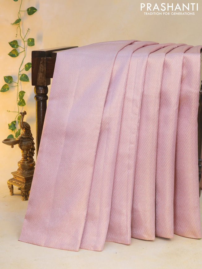 Pure kanchipuram silk saree pastel pink with allover silver zari woven brocade weaves in borderless style