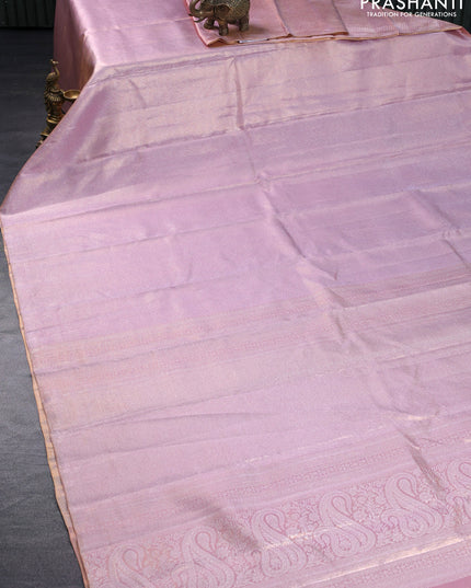 Pure kanchipuram silk saree pastel pink with allover silver zari woven brocade weaves in borderless style