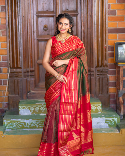 Pure soft silk saree manthulir green and red with allover zari weaves and long zari woven border