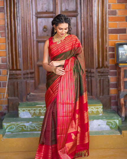 Pure soft silk saree manthulir green and red with allover zari weaves and long zari woven border