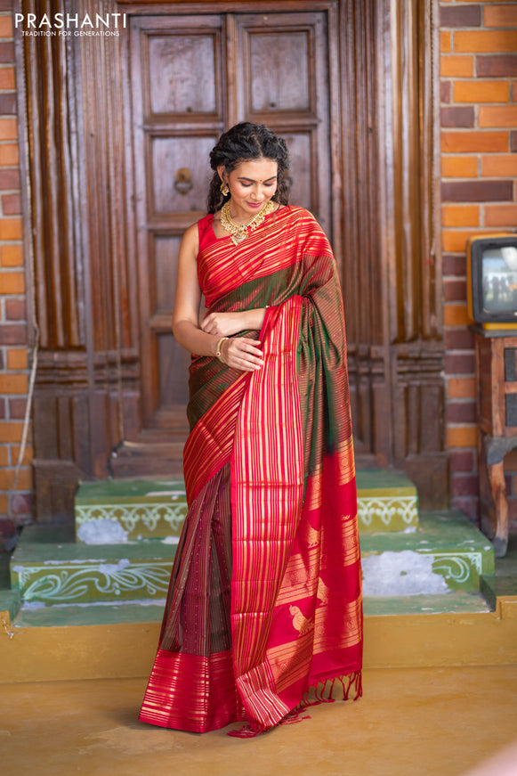 Pure soft silk saree manthulir green and red with allover zari weaves and long zari woven border