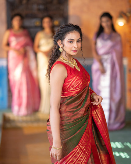 Pure soft silk saree manthulir green and red with allover zari weaves and long zari woven border