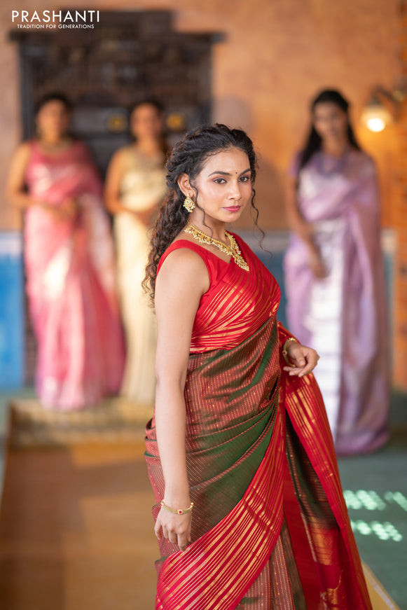 Pure soft silk saree manthulir green and red with allover zari weaves and long zari woven border