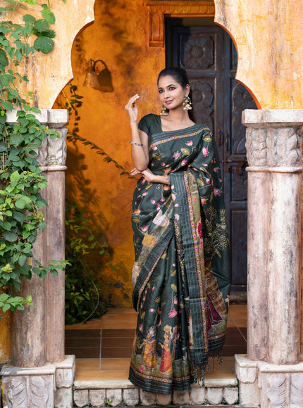 Pure tussar silk saree dark sap green with allover digital pichwai prints & pita work and zari line border