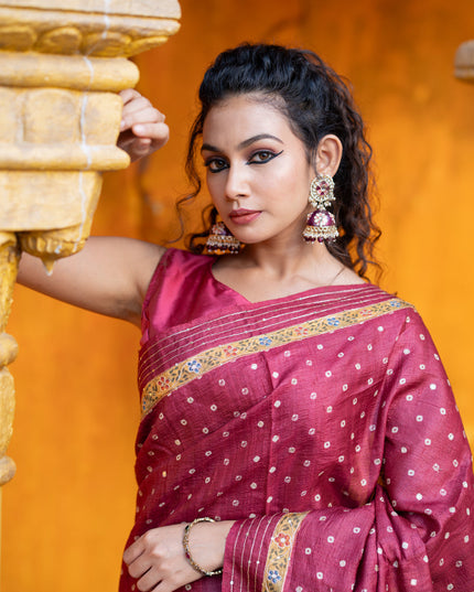 Pure tussar silk saree maroon with allover bandhani butta prints & pita work and zari line border