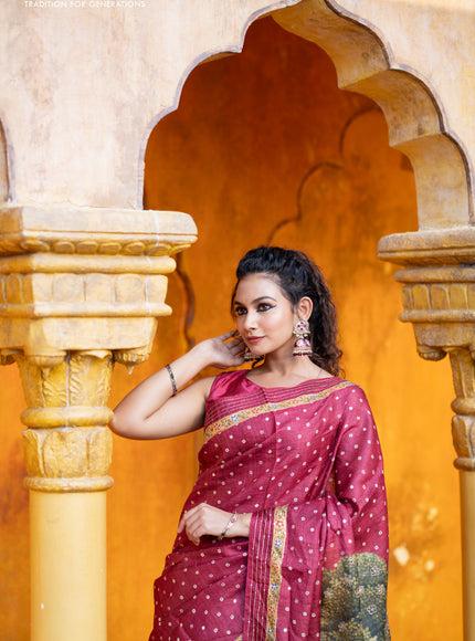 Pure tussar silk saree maroon with allover bandhani butta prints & pita work and zari line border