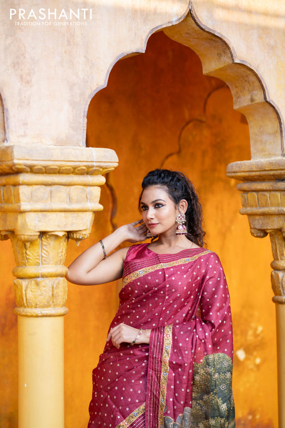 Pure tussar silk saree maroon with allover bandhani butta prints & pita work and zari line border