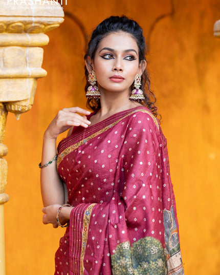 Pure tussar silk saree maroon with allover bandhani butta prints & pita work and zari line border