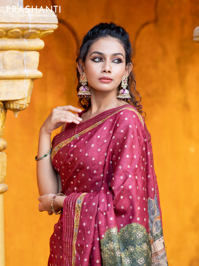 Pure tussar silk saree maroon with allover bandhani butta prints & pita work and zari line border