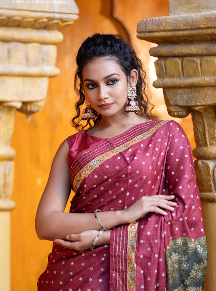 Pure tussar silk saree maroon with allover bandhani butta prints & pita work and zari line border