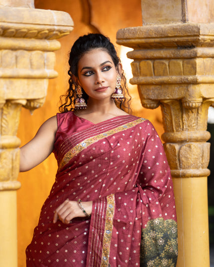 Pure tussar silk saree maroon with allover bandhani butta prints & pita work and zari line border