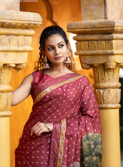 Pure tussar silk saree maroon with allover bandhani butta prints & pita work and zari line border