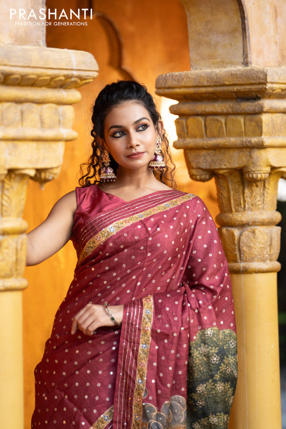 Pure tussar silk saree maroon with allover bandhani butta prints & pita work and zari line border