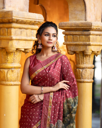 Pure tussar silk saree maroon with allover bandhani butta prints & pita work and zari line border