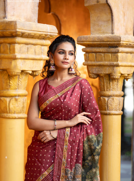 Pure tussar silk saree maroon with allover bandhani butta prints & pita work and zari line border