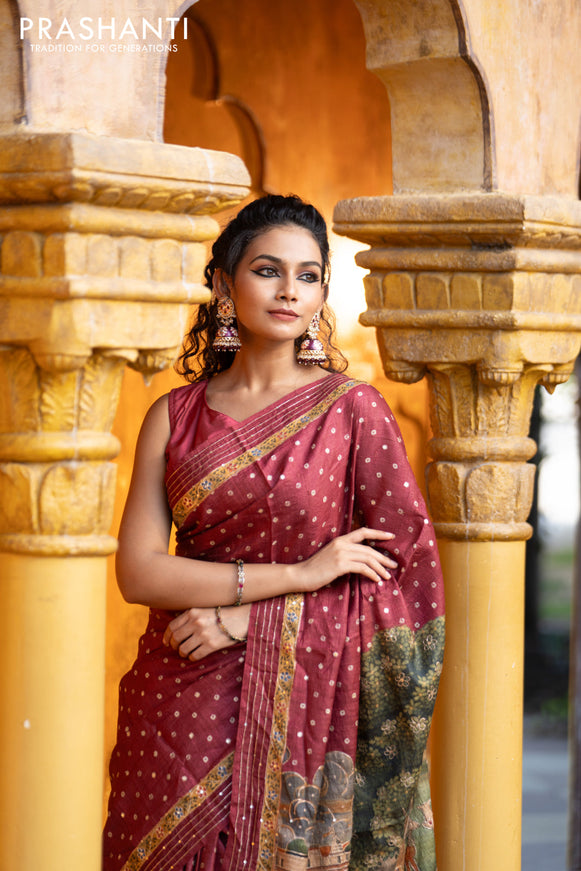 Pure tussar silk saree maroon with allover bandhani butta prints & pita work and zari line border