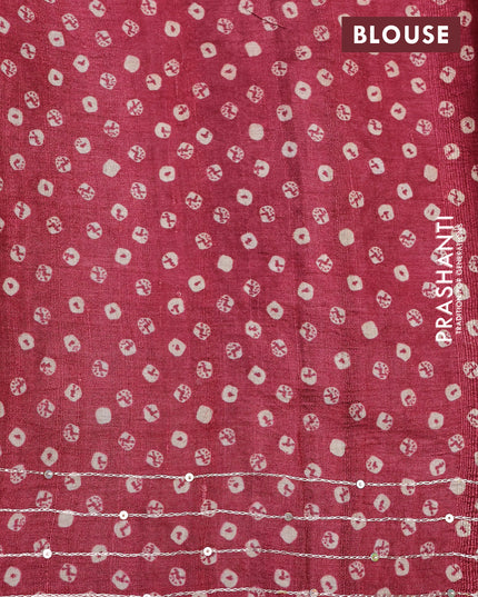 Pure tussar silk saree maroon with allover bandhani butta prints & pita work and zari line border