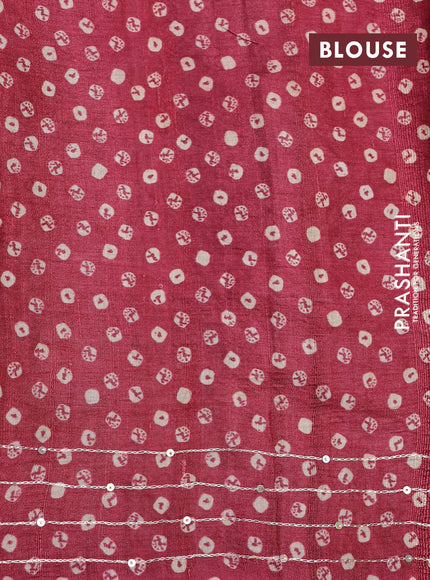 Pure tussar silk saree maroon with allover bandhani butta prints & pita work and zari line border