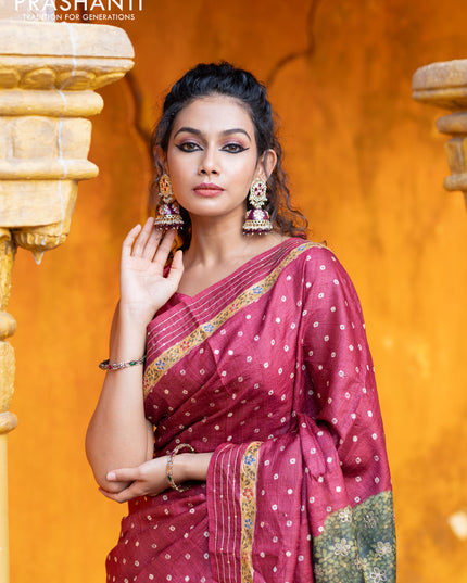 Pure tussar silk saree maroon with allover bandhani butta prints & pita work and zari line border