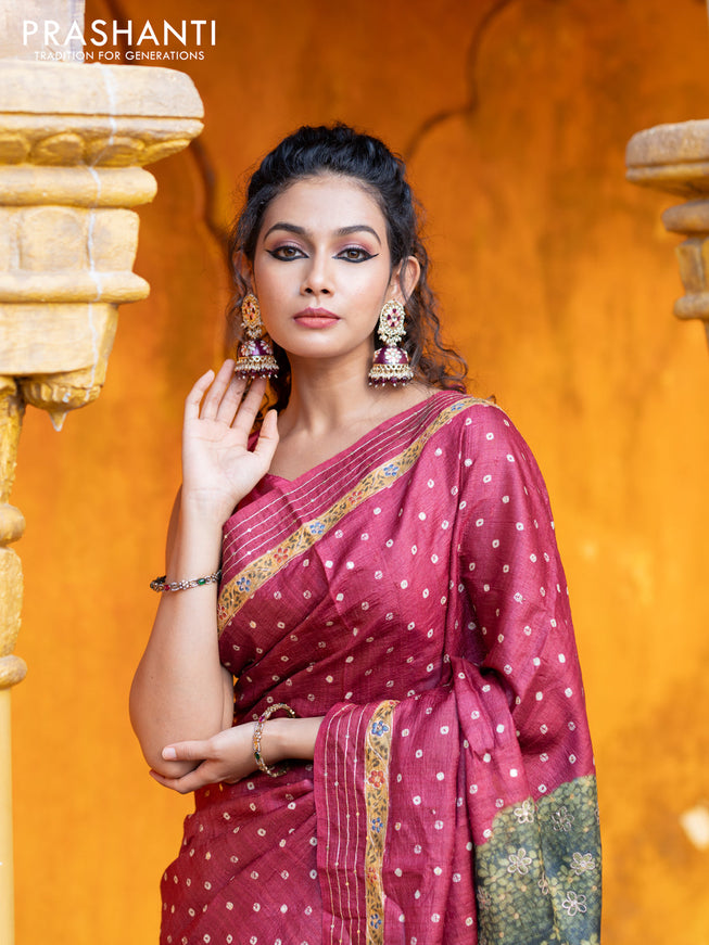 Pure tussar silk saree maroon with allover bandhani butta prints & pita work and zari line border