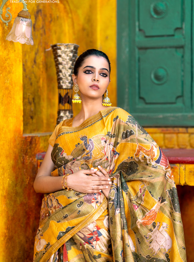 Pure tussar silk saree mustard yellow with allover digital pichwai prints & pita work and zari line border