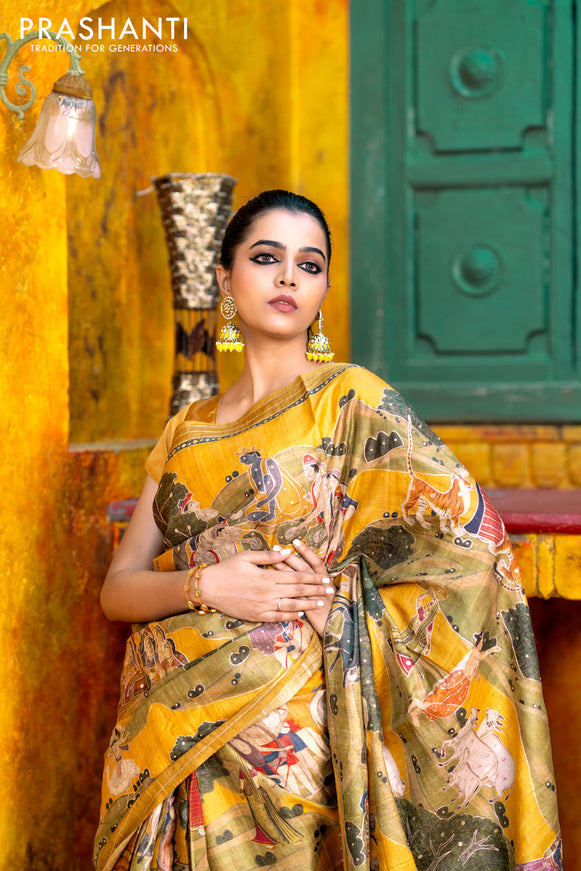 Pure tussar silk saree mustard yellow with allover digital pichwai prints & pita work and zari line border