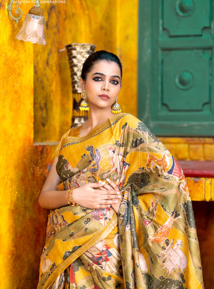 Pure tussar silk saree mustard yellow with allover digital pichwai prints & pita work and zari line border