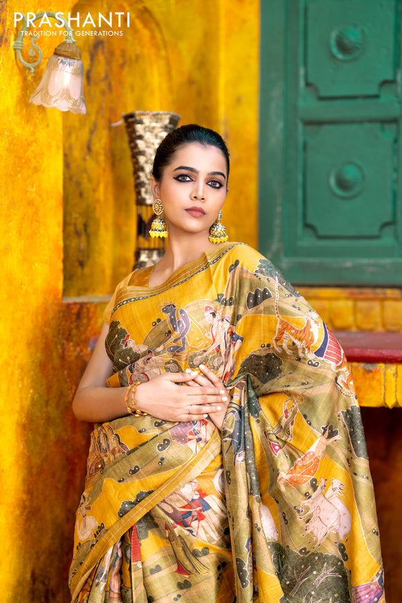 Pure tussar silk saree mustard yellow with allover digital pichwai prints & pita work and zari line border