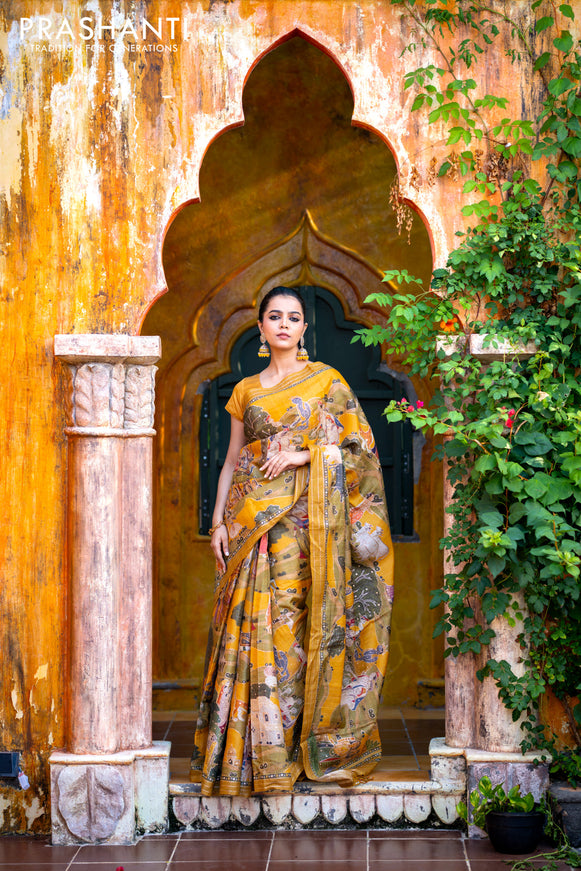 Pure tussar silk saree mustard yellow with allover digital pichwai prints & pita work and zari line border