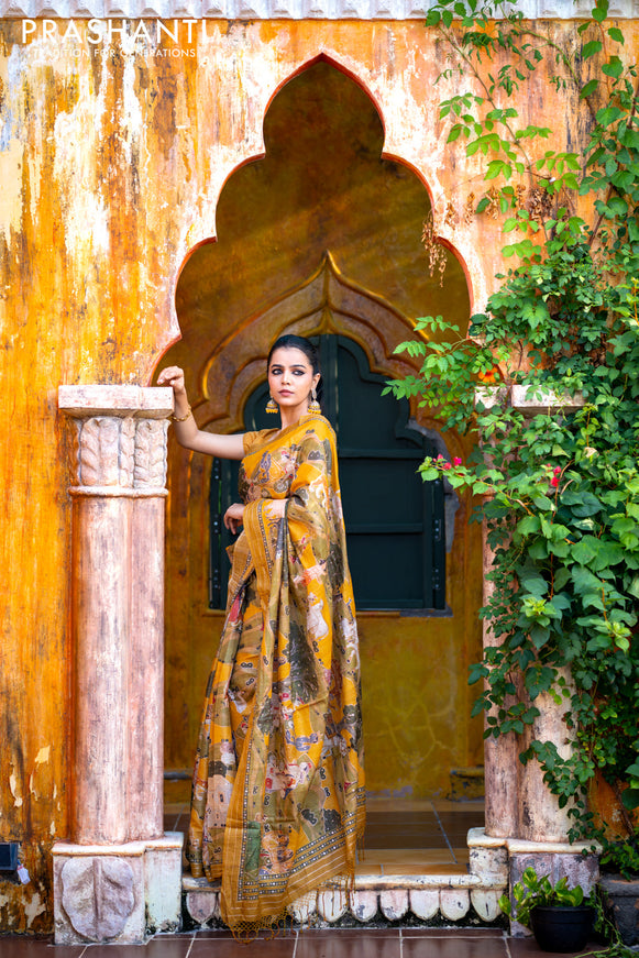 Pure tussar silk saree mustard yellow with allover digital pichwai prints & pita work and zari line border