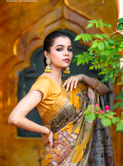 Pure tussar silk saree mustard yellow with allover digital pichwai prints & pita work and zari line border