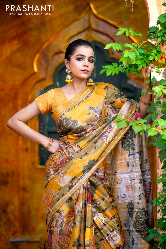 Pure tussar silk saree mustard yellow with allover digital pichwai prints & pita work and zari line border