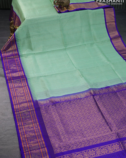 Kuppadam silk cotton saree teal green and blue with allover zari checks & buttas and temple deisgn zari woven border