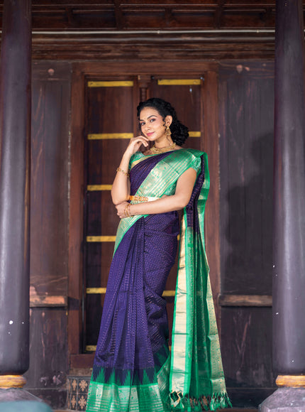 Kuppadam silk cotton saree blue and teal green with allover zari checks & buttas and temple woven elephant design zari border