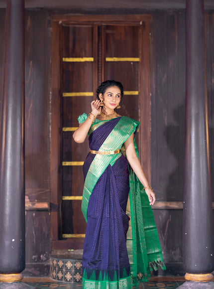 Kuppadam silk cotton saree blue and teal green with allover zari checks & buttas and temple woven elephant design zari border