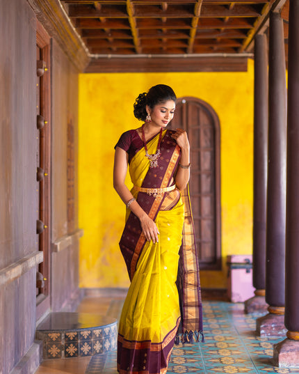 Kuppadam silk cotton saree lime yellow and deep maroon with silver & gold zari woven tilak buttas and temple design rettapet zari woven butta border