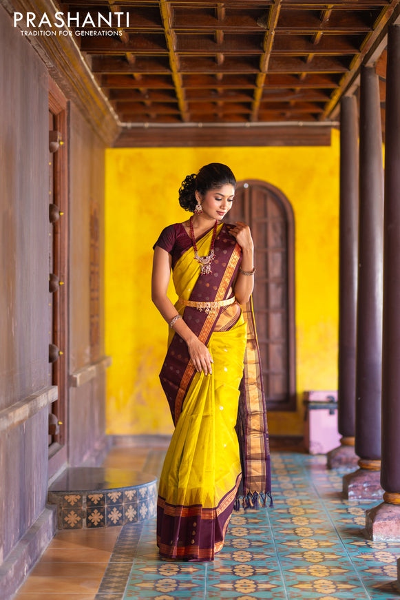 Kuppadam silk cotton saree lime yellow and deep maroon with silver & gold zari woven tilak buttas and temple design rettapet zari woven butta border