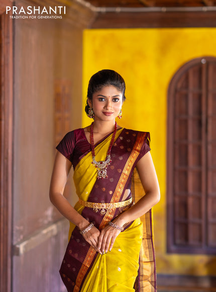 Kuppadam silk cotton saree lime yellow and deep maroon with silver & gold zari woven tilak buttas and temple design rettapet zari woven butta border